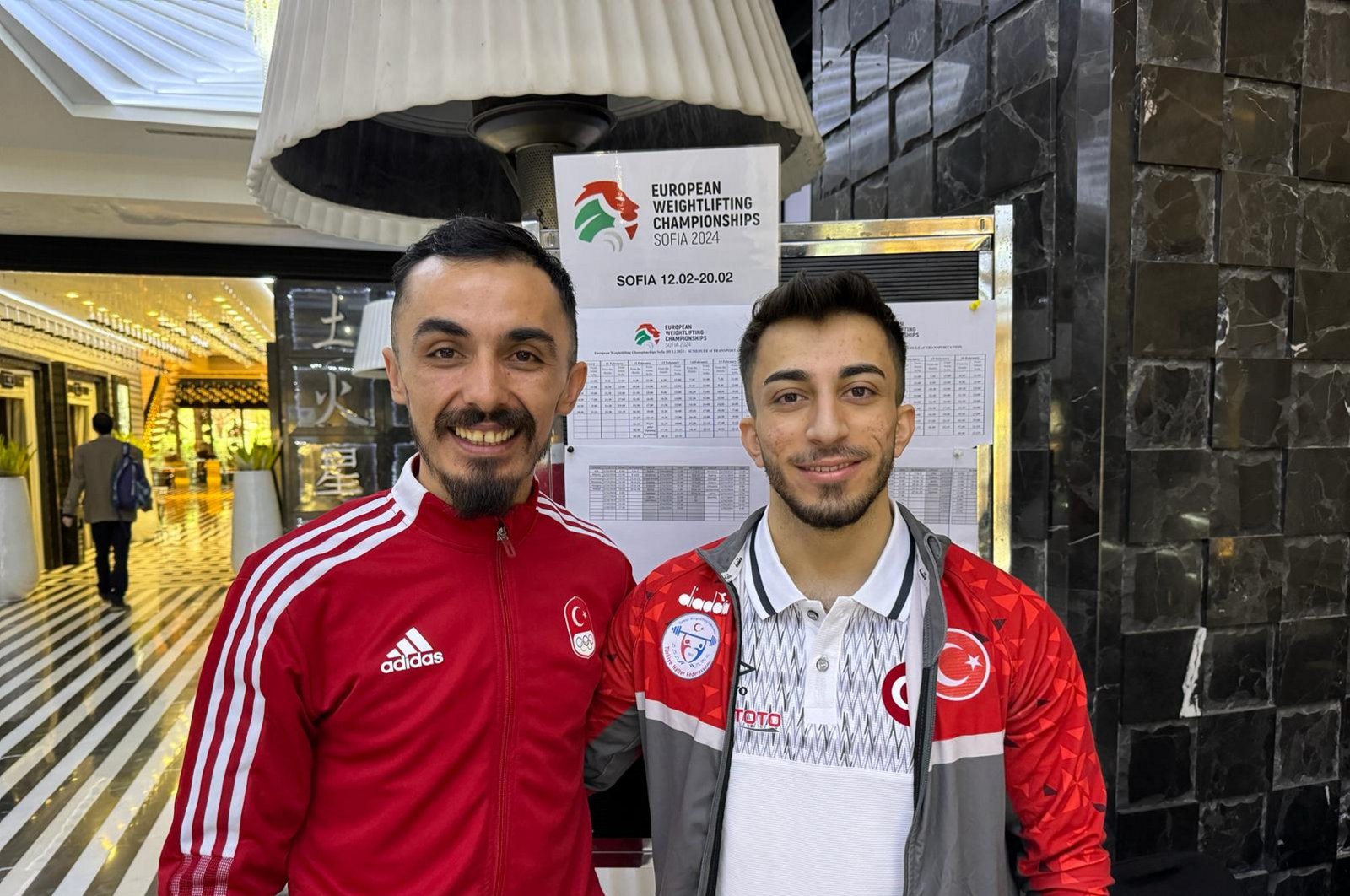 Turkish weightlifters Muammer Şahin (L) and Harun Algül pose for a photo ahead of the European Weightlifting Championship, Sofia, Bulgaria, Feb. 13, 2024. (AA Photo)