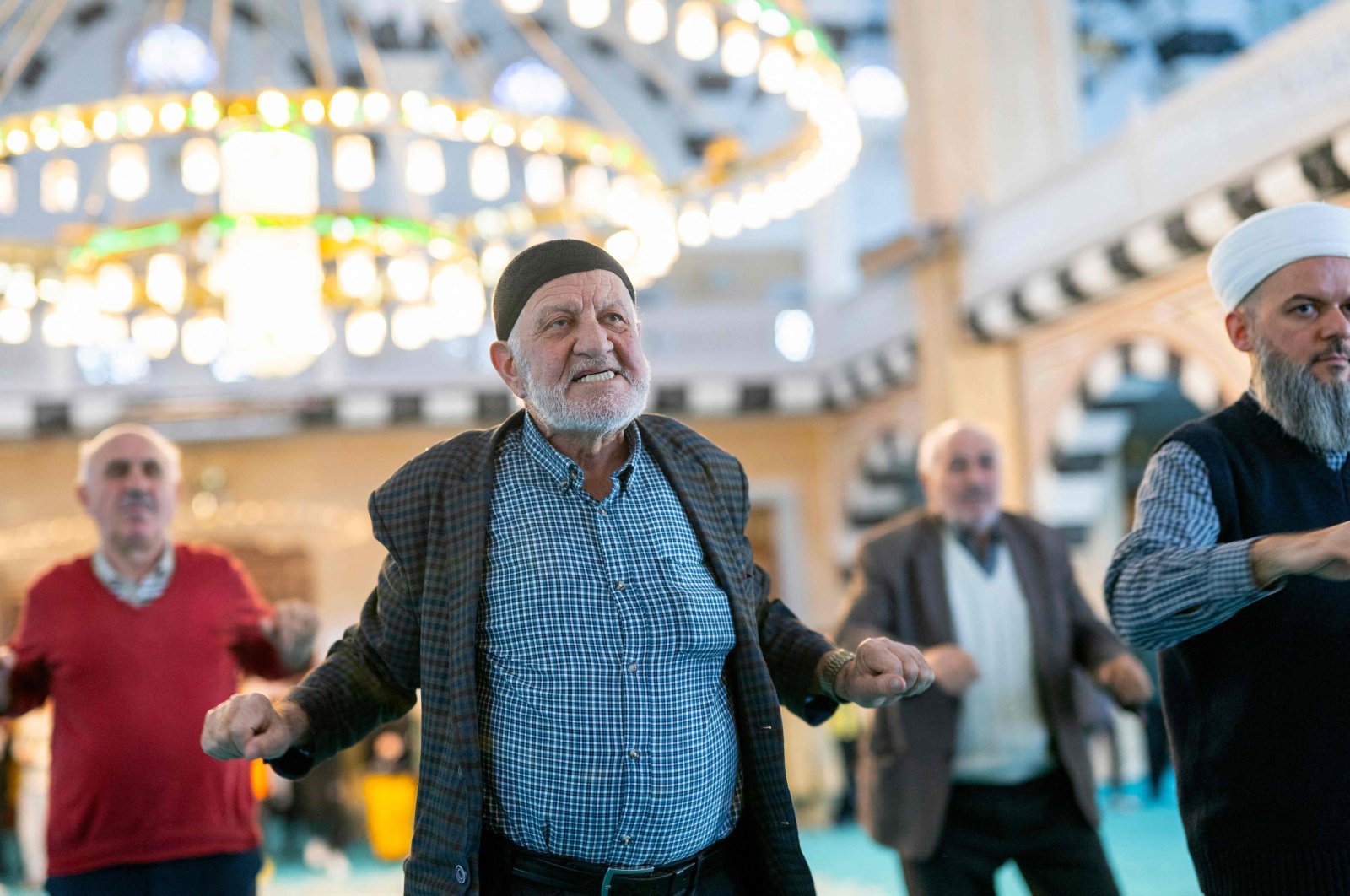 Worshippers take part in a fitness session after prayer in a mosque of the Bağcılar district in Istanbul, Türkiye, Feb. 8, 2024. (AFP Photo)