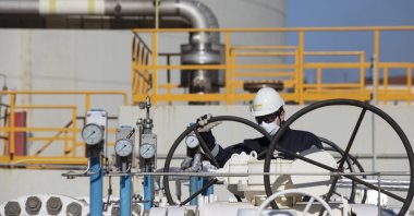 An employee works at a LNG terminal in Aliağa, Izmir, western Türkiye, Feb. 18, 2022. (AA Photo)