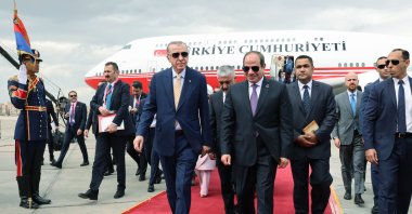 President Recep Tayyip Erdoğan walks on the red carpet next to Egyptian President Abdel-Fattah el-Sissi (R) at Cairo International Airport, Cairo, Egypt, Feb. 14, 2024. (İHA Photo)