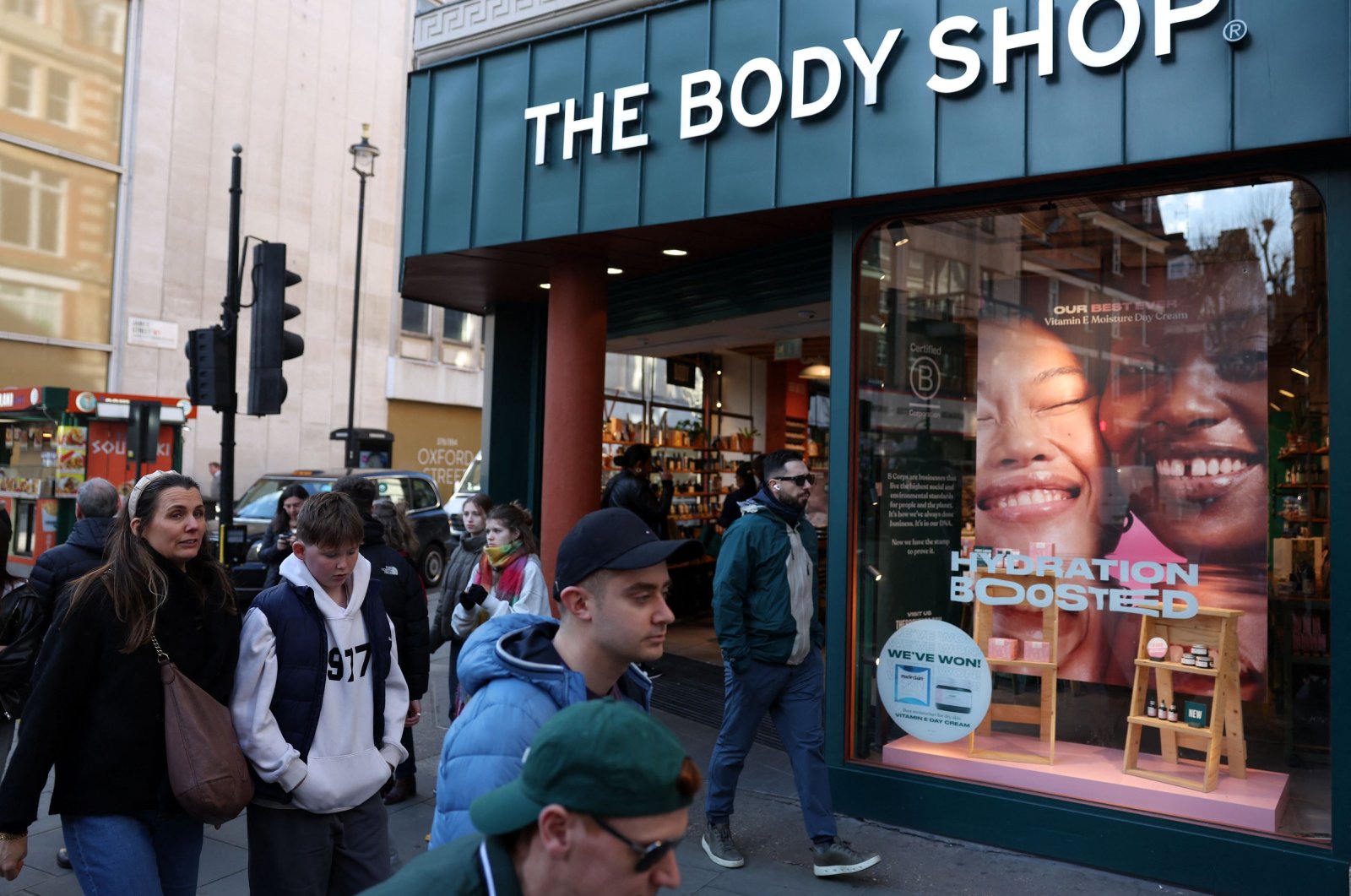 Pedestrians walk by a branch of The Body Shop in central London, U.K., Feb. 12, 2024. (AFP Photo)