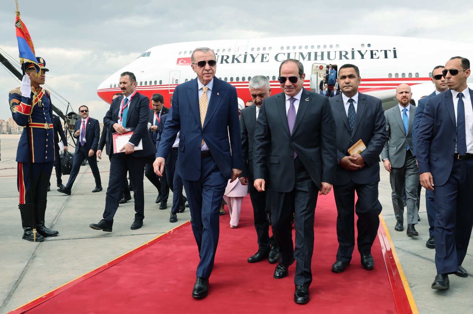 President Recep Tayyip Erdoğan walks on the red carpet next to Egyptian President Abdel-Fattah el-Sissi (R) at Cairo International Airport, Cairo, Egypt, Feb. 14, 2024. (İHA Photo)