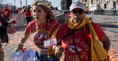 People flee after shots were fired near the Kansas City Chiefs' Super Bowl LVIII victory parade, Kansas City, Missouri, U.S., Feb. 14, 2024. (AFP Photo)