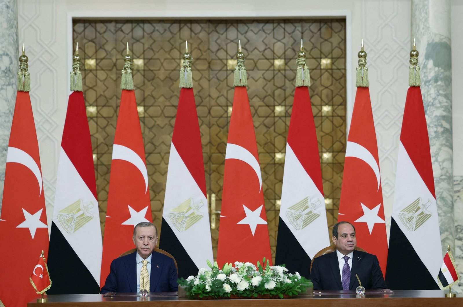 President Recep Tayyip Erdoğan (L) and Egyptian President Abdel-Fattah el-Sissi attend a signing ceremony in Cairo, Egypt, Feb. 14, 2024. (Reuters Photo)
