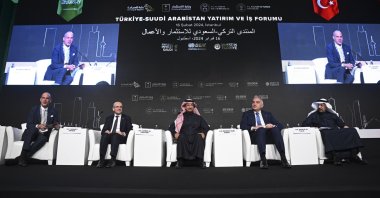 Treasury and Finance Minister Mehmet Şimşek (2nd L), Saudi Tourism Minister Ahmed Al Khateeb (3rd L), Culture and Tourism Minister Mehmet Nuri Ersoy (2nd R) and Saudi Investment Minister Khalid A. Al Falih during the Türkiye-Saudi Arabia Investment and Business Forum, Istanbul, Türkiye, Feb. 16, 2024. (AA Photo)