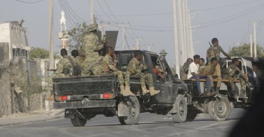 Security patrol the streets during fighting between al-Shabab extremists and soldiers in Mogadishu, Somalia, Feb. 21, 2023. (AP Photo)