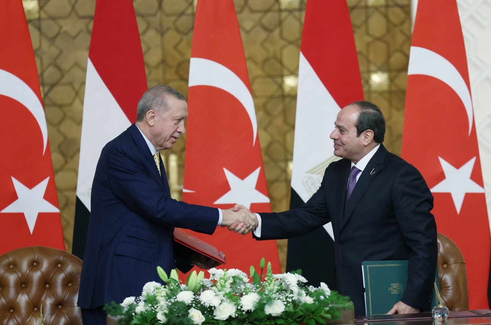 President Recep Tayyip Erdoğan and Egyptian President Abdel Fattah al-Sisi attend a signing ceremony in Cairo, Egypt, Feb. 14, 2024. (Reuters Photo)
