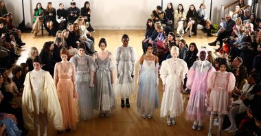Models present creations by London-based Turkish designer Bora Aksu during a catwalk presentation for the Autumn/Winter 2024 collection, during London Fashion Week in London, England, Feb. 16, 2024. (AFP Photo)