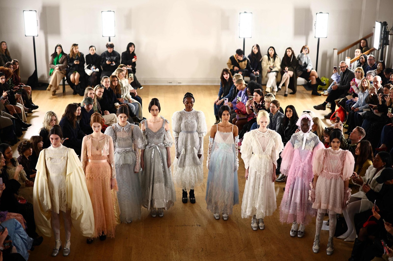 Models present creations by London-based Turkish designer Bora Aksu during a catwalk presentation for the Autumn/Winter 2024 collection, during London Fashion Week in London, England, Feb. 16, 2024. (AFP Photo)