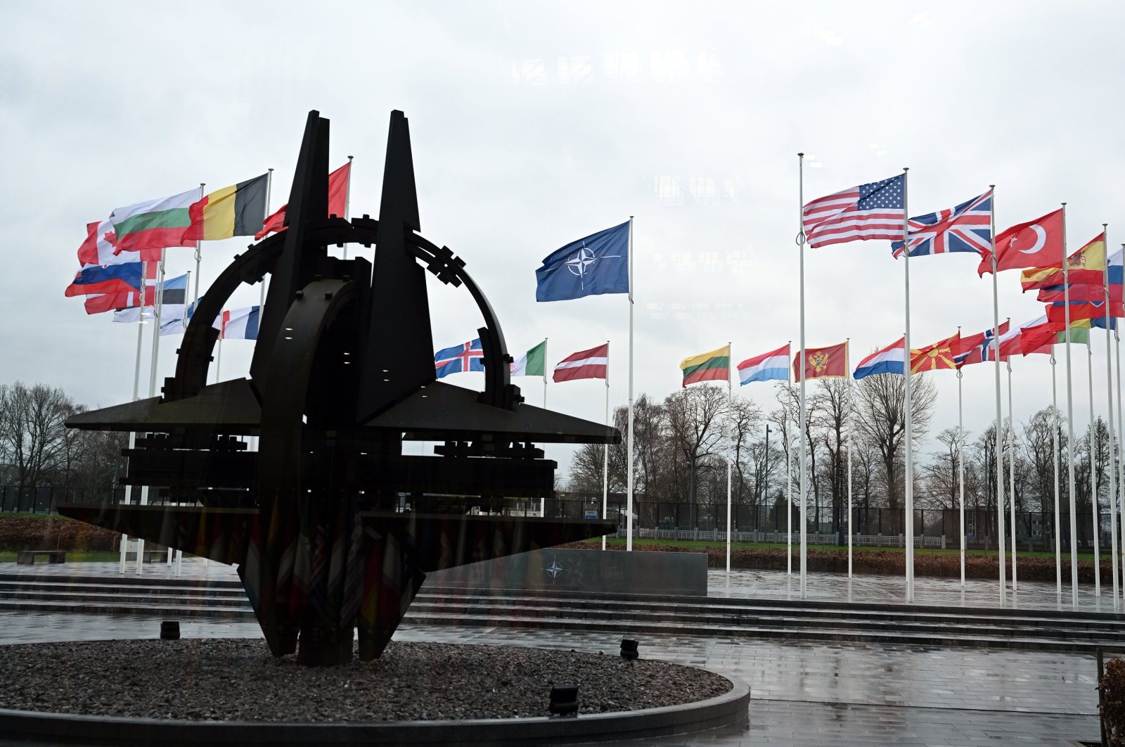 Flags of NATO and its members outside the bloc&#039;s headquarters, Brussels, Belgium, Feb. 17, 2024. (AA Photo)