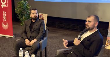 Daily Sabah Editor-in-Chief Ibrahim Altay (L) and Mustafa Akar, publishing director of Lacivert Magazine, give speeches during their Nimes visit, France, Feb. 18, 2024. (Sabah Archive Photo)