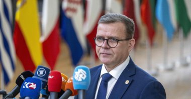 Finland's Prime Minister Petteri Orpo speaks to the press as he arrives before the start of a European Council meeting at the European headquarters in Brussels, Feb. 1, 2024. (AFP File Photo)