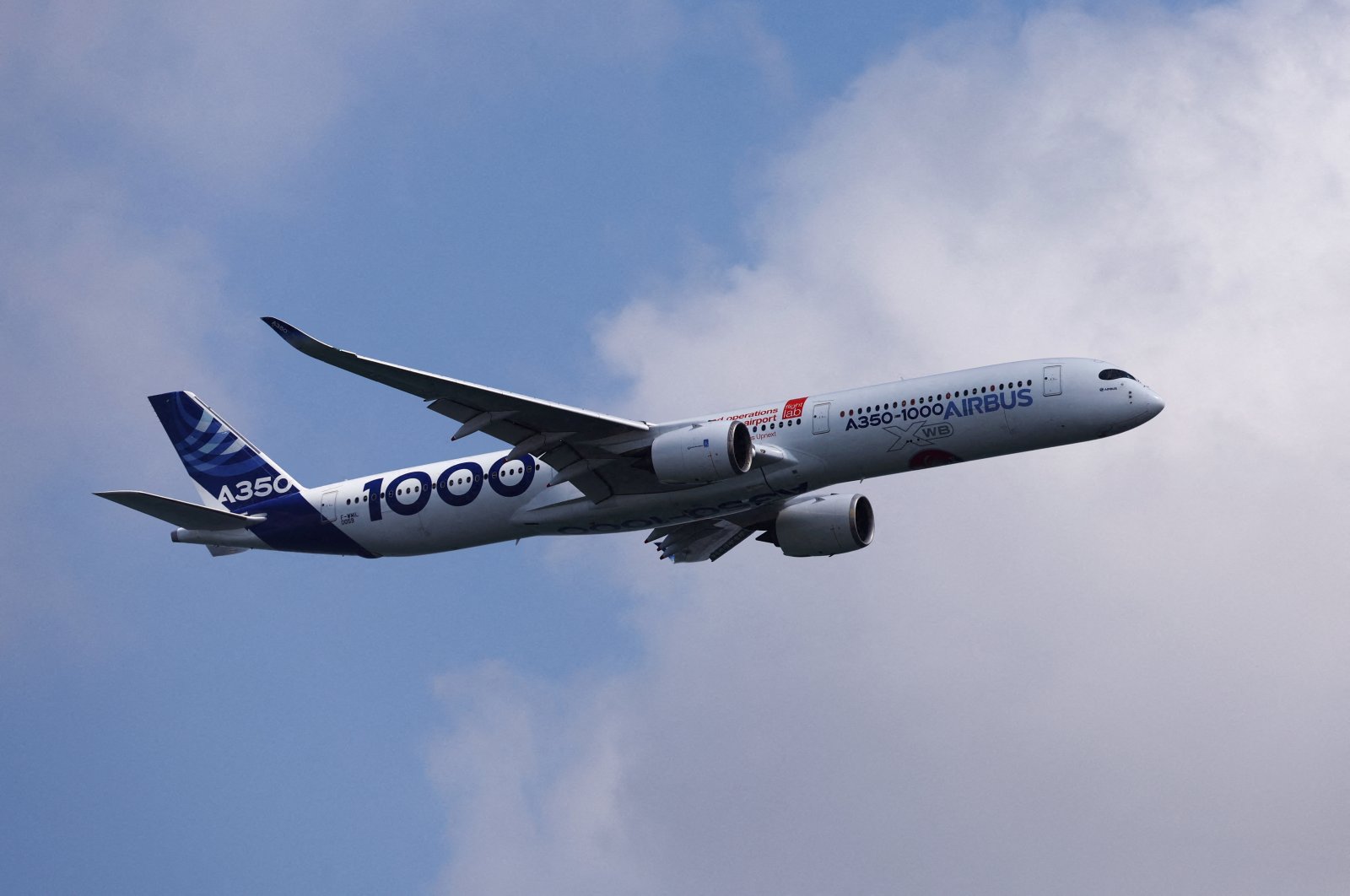 An Airbus A350-1000 flies during an aerial flying display ahead of the Singapore Airshow at Changi Exhibition Centre, Singapore, Feb. 18, 2024. (Reuters Photo)