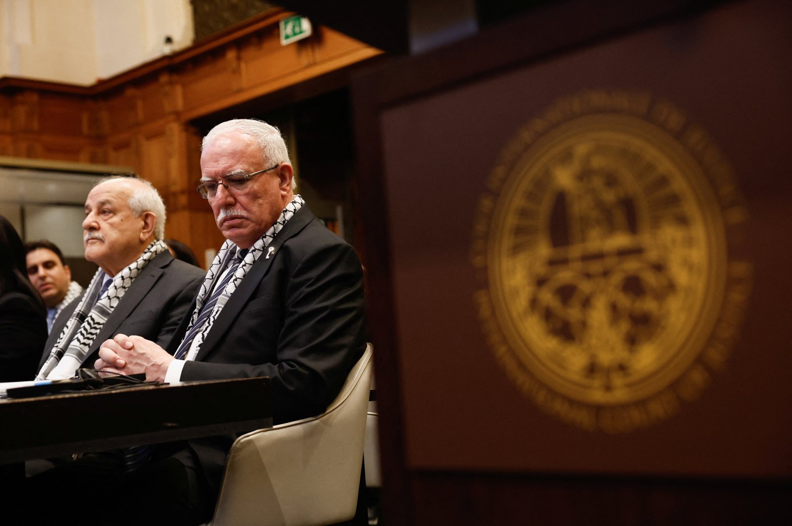 Palestinian Foreign Minister Riyad al-Maliki and Palestinian U.N. envoy Riyad Mansour at the ICJ in The Hague, the Netherlands, Feb. 19, 2024. (Reuters Photo)