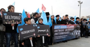 A group of activists, including ethnic Uyghurs, stages a protest against China in Istanbul, Türkiye, Feb. 4, 2024. (AA Photo)
