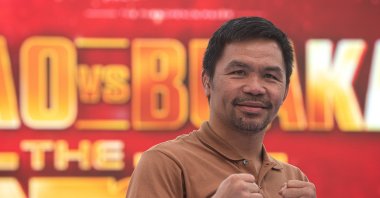 Filipino boxer Manny Pacquiao poses for a photo to the media during a press conference for the exhibition boxing fight at Iconsiam, Bangkok, Thailand, July 23, 2023. (Getty Images Photo)