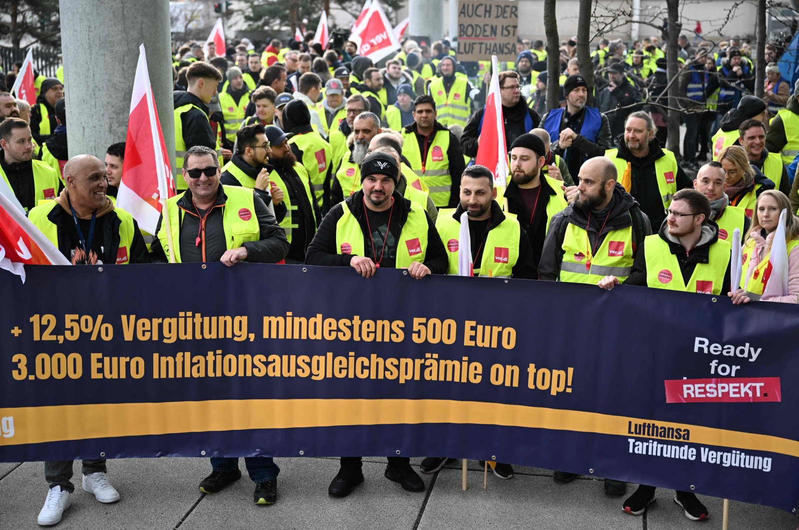 Employees of German airline Lufthansa protest with a banner reading &quot;Ready for respect,&quot; demanding higher wages and inflation compensation, outside Frankfurt Airport, Frankfurt, Germany, Feb. 20, 2024. (AFP Photo)