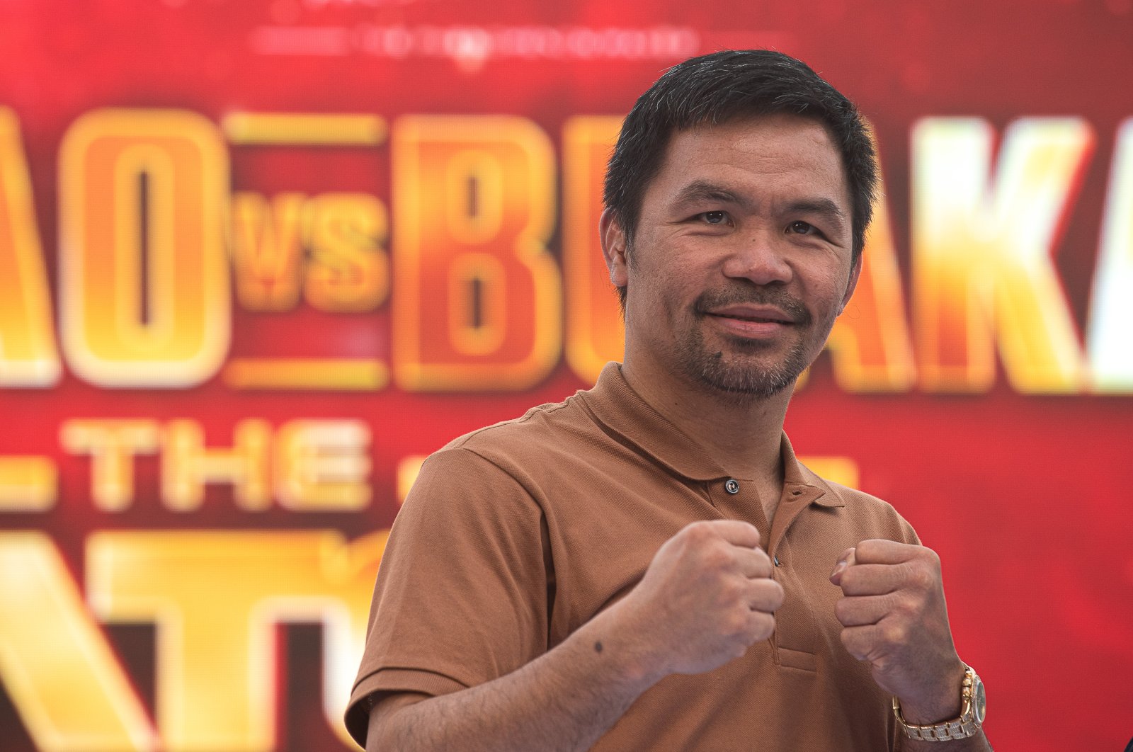 Filipino boxer Manny Pacquiao poses for a photo to the media during a press conference for the exhibition boxing fight at Iconsiam, Bangkok, Thailand, July 23, 2023. (Getty Images Photo)