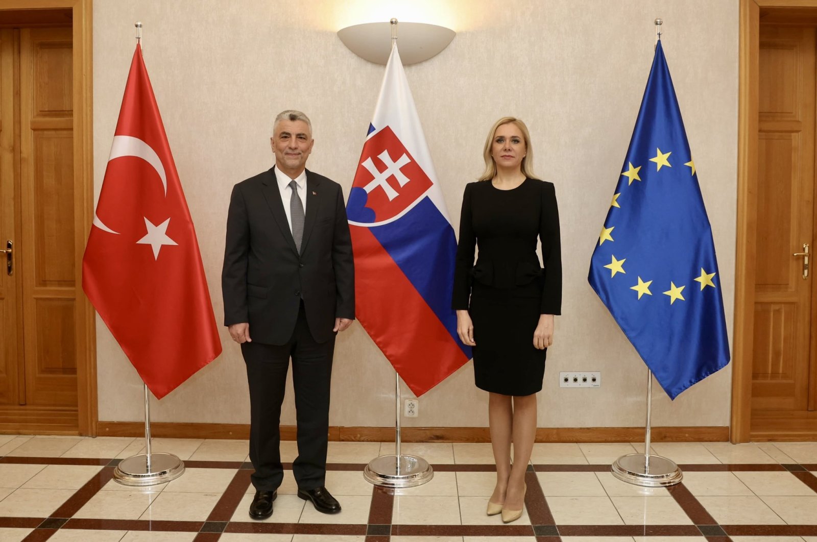 Trade Minister Ömer Bolat poses along with Deputy Prime Minister of Slovakia and Minister of Economy Denisa Sakova, Bratislava, Slovakia, Feb. 20, 2024. (DHA Photo)