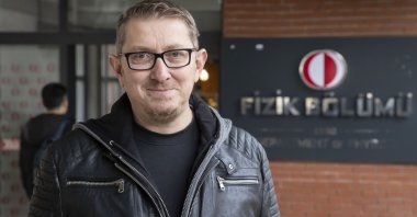 Former NASA astrophysicist Umut Yıldız speaks with local media at Middle East Technical University, Ankara, Türkiye, Feb. 21, 2024. (AA Photo)