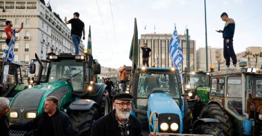 Greek farmers, with their tractors, protest near the Greek parliament over rising energy costs and competition from imports, Athens, Greece, Feb. 20, 2024. (Reuters Photo)