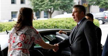 Then-Deputy Foreign Minister Sedat Önal shakes hands with U.S. State Department protocol official after his meeting with Deputy Secretary of State John Sullivan at State Department in Washington, U.S., Aug. 8, 2018. (Reuters File Photo)