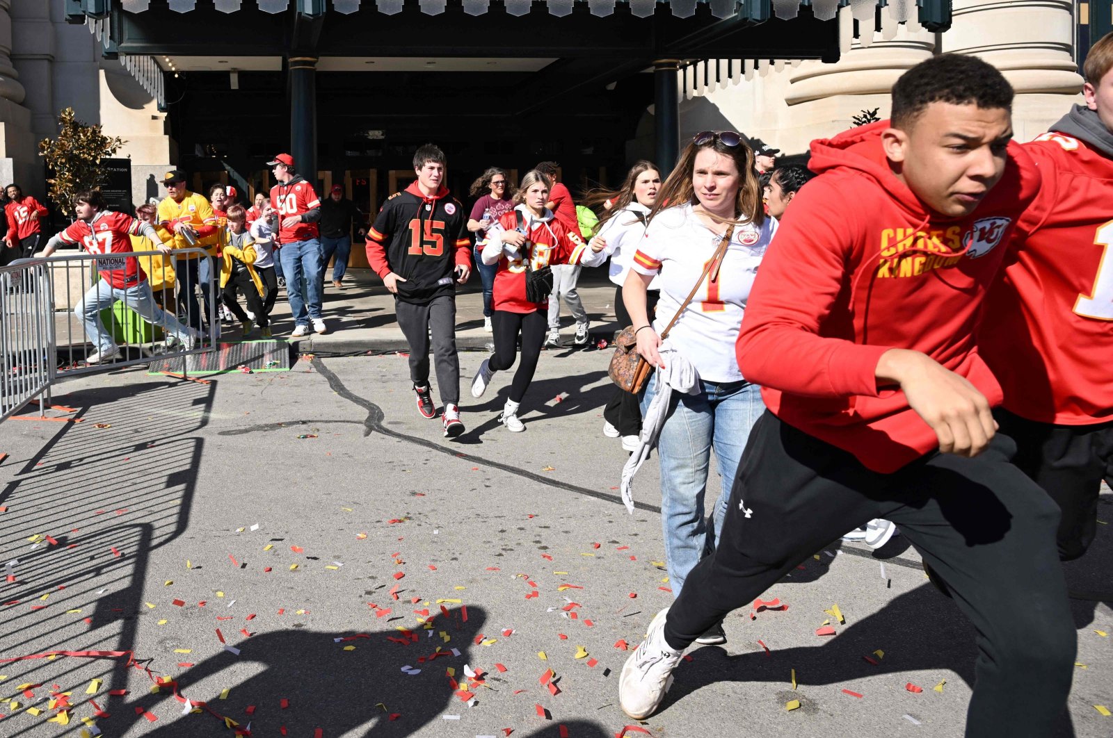 People flee after shots were fired near the Kansas City Chiefs&#039; Super Bowl LVIII victory parade in Kansas City, Missouri, U.S., Feb. 14, 2024. (AFP Photo)