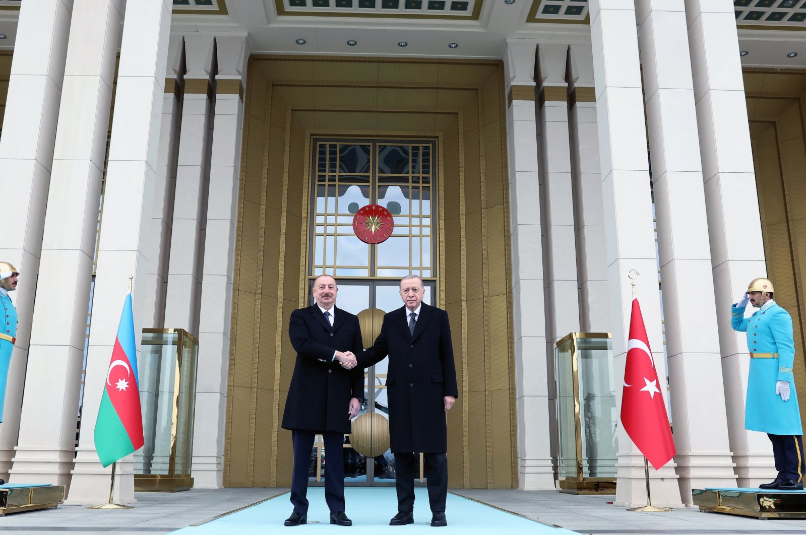 President Recep Tayyip Erdoğan shakes hands with Azerbaijani President Ilham Aliyev (L) at the Presidential Complex, Ankara, Türkiye, Feb. 19, 2024. (AA Photo)