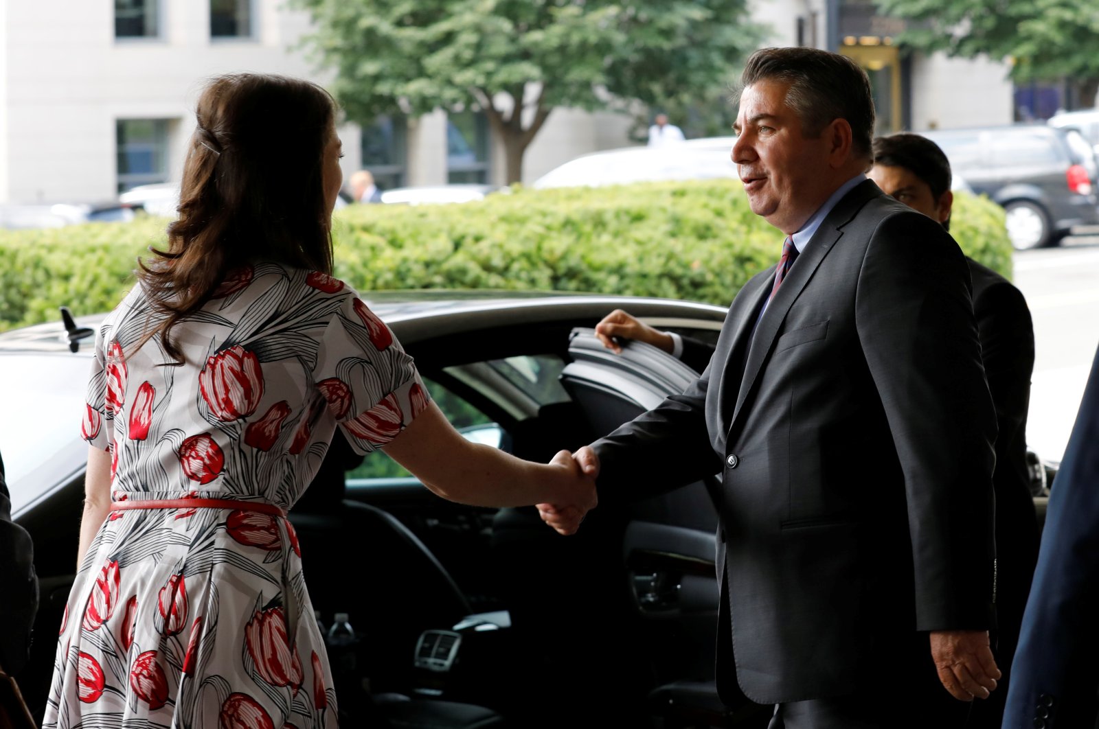 Then-Deputy Foreign Minister Sedat Önal shakes hands with U.S. State Department protocol official after his meeting with Deputy Secretary of State John Sullivan at State Department in Washington, U.S., Aug. 8, 2018. (Reuters File Photo)