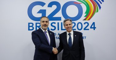 Foreign Minister Hakan Fidan (L) shakes hands with U.S. Secretary of State Antony Blinken, in Rio de Janeiro, Brazil, Feb. 21, 2024. (İHA Photo)