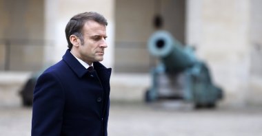 French President Emmanuel Macron leads a "Prise d'armes" ("Taking up arms") military ceremony in the courtyard of the Hotel National des Invalides in Paris, France, Feb. 19, 2024. (EPA Photo)