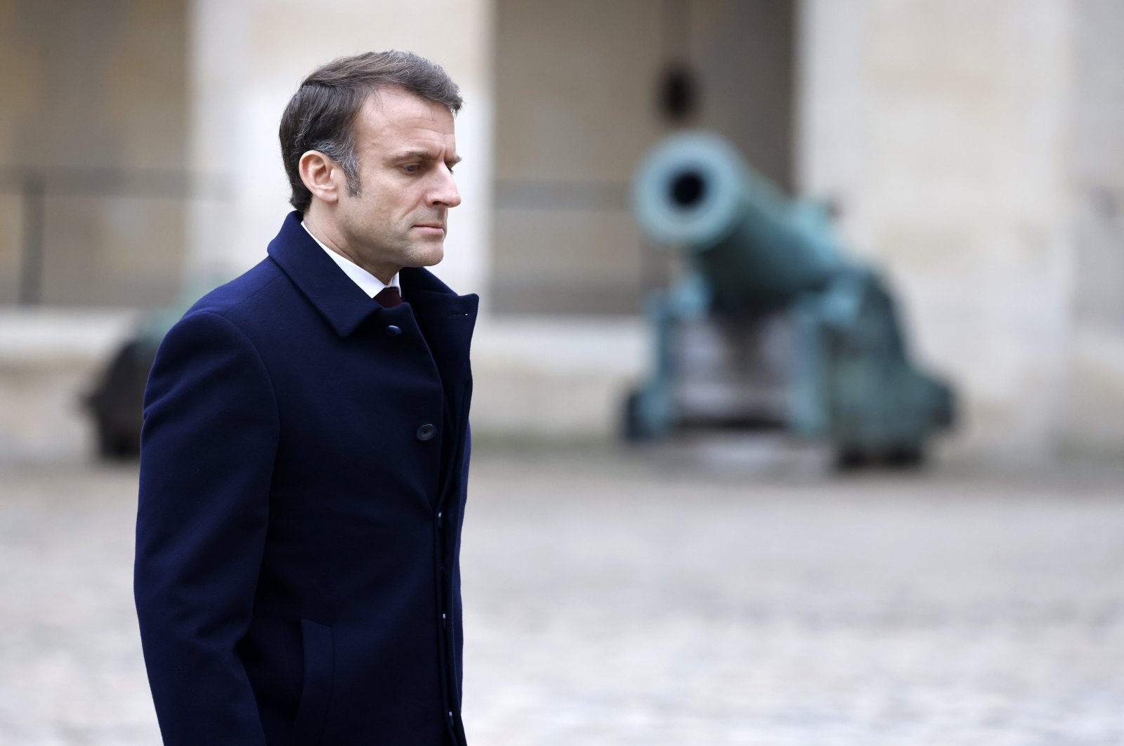 French President Emmanuel Macron leads a "Prise d'armes" ("Taking up arms") military ceremony in the courtyard of the Hotel National des Invalides in Paris, France, Feb. 19, 2024. (EPA Photo)