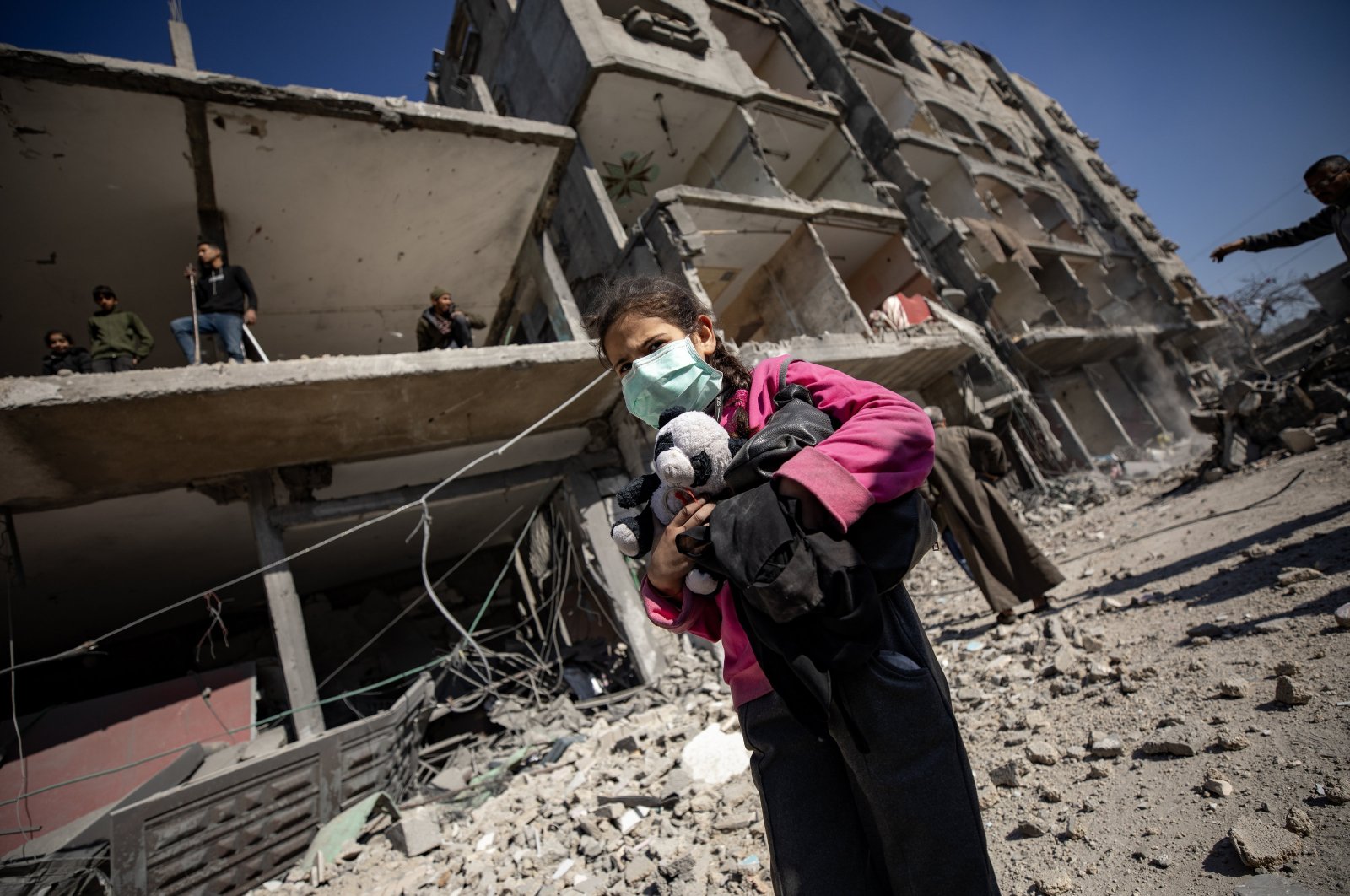 A Palestinian child walks past a destroyed building following an Israeli airstrike, in Rafah, southern Gaza Strip, Palestine, Feb. 22, 2024. (EPA Photo)