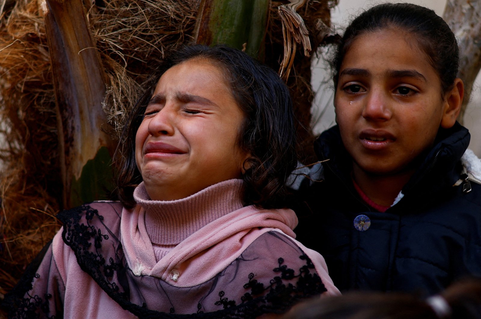 Mourners react following the death of Palestinians in Israeli strikes, in Rafah, southern Gaza Strip, Feb. 22, 2024. (Reuters Photo)