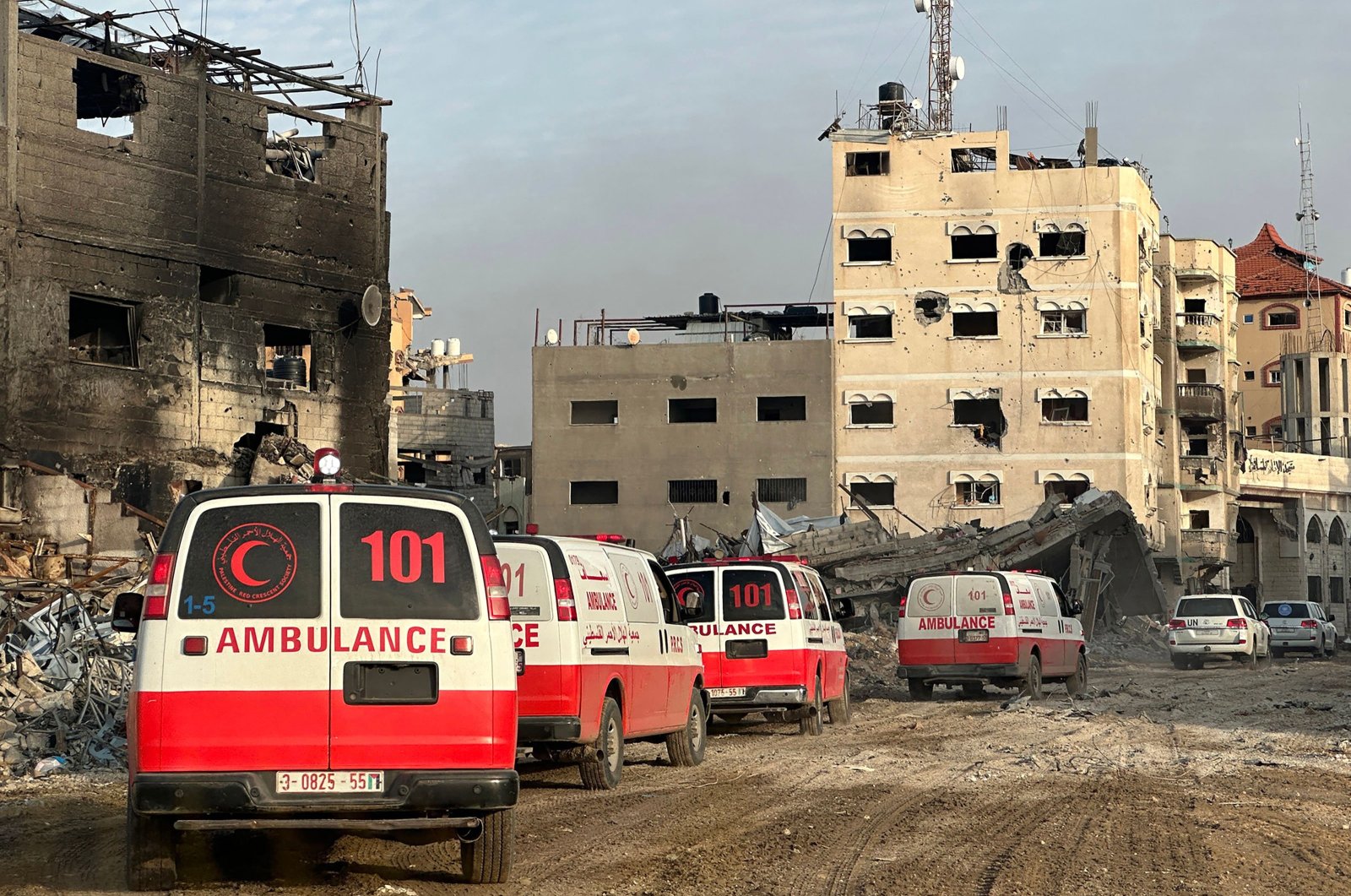 A convoy of ambulances during a World Health Organization (WHO), U.N. humanitarian agency OCHA and Palestinian Red Crescent mission to evacuate patients from Nasser Hospital amid Israeli attacks, Khan Younis, Gaza Strip, Palestine, Feb. 18, 2024. (WHO Handout via AFP File Photo)