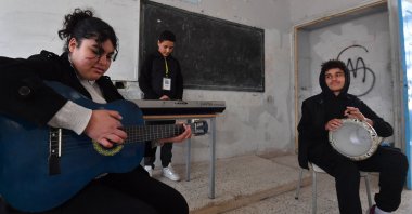 Students attend a music class financed by the after-school club Tunisia 88, at the Haffouz secondary school in Tunisia's northern Kairouan region. Feb. 2, 2024. (AFP Photo)