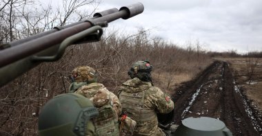 Ukrainian anti-aircraft gunners of the 93rd Separate Mechanized Brigade Kholodny Yar move to their position in the Bakhmut direction in the Donetsk region, Ukraine, Feb. 20, 2024. (AFP Photo)