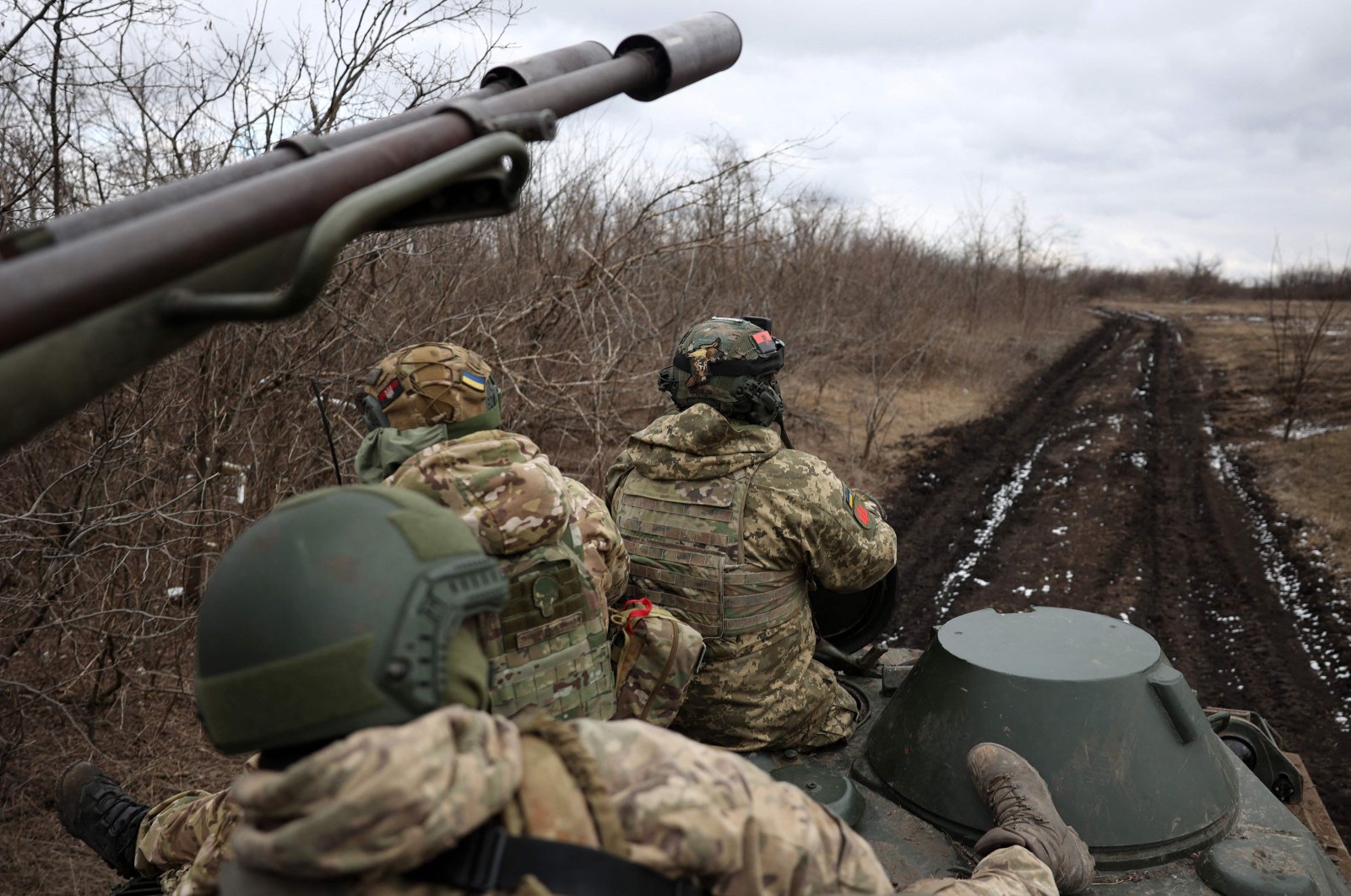 Ukrainian anti-aircraft gunners of the 93rd Separate Mechanized Brigade Kholodny Yar move to their position in the Bakhmut direction in the Donetsk region, Ukraine, Feb. 20, 2024. (AFP Photo)