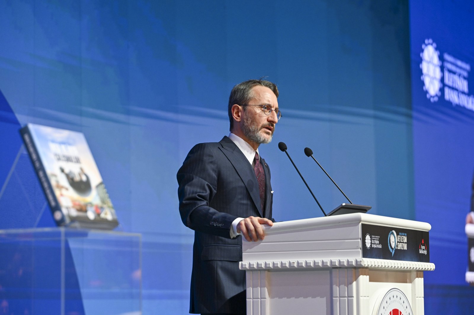Communications Director Fahrettin Altun speaks at a symposium commemorating one year after the devastating earthquakes in Türkiye&#039;s southeast, Feb. 5, 2024. (AA Photo)