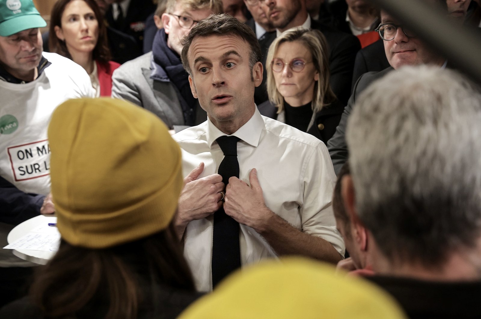French President Emmanuel Macron (Center) gestures as he speaks with members of the agricultural unions National Federation of Agricultural Holders&#039; Unions (FNSEA), Young Farmers (JA), Rural Coordination (CR) during the opening day of the 60th International Agriculture Fair (Salon de l&#039;Agriculture), in Paris, France, Feb. 24, 2024. (EPA Photo)