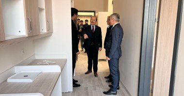 Mersin Governor Ali Hamza Pehlivan (C), alongside other officials, inspects the dorm built in the Çiflikköy Campus of Mersin University, Mersin, southern Türkiye, Feb. 25, 2024. (IHA Photo)