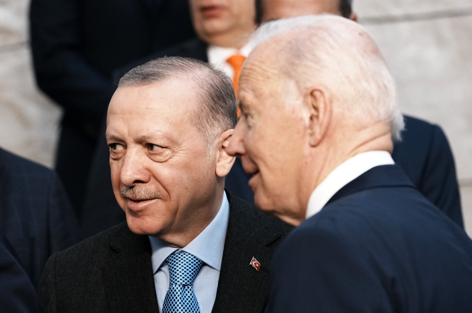 U.S. President Joe Biden speaks with President Recep Tayyip Erdoğan at a group photo during an extraordinary NATO summit at NATO headquarters in Brussels, Belgium, March 24, 2022. (AP Photo)