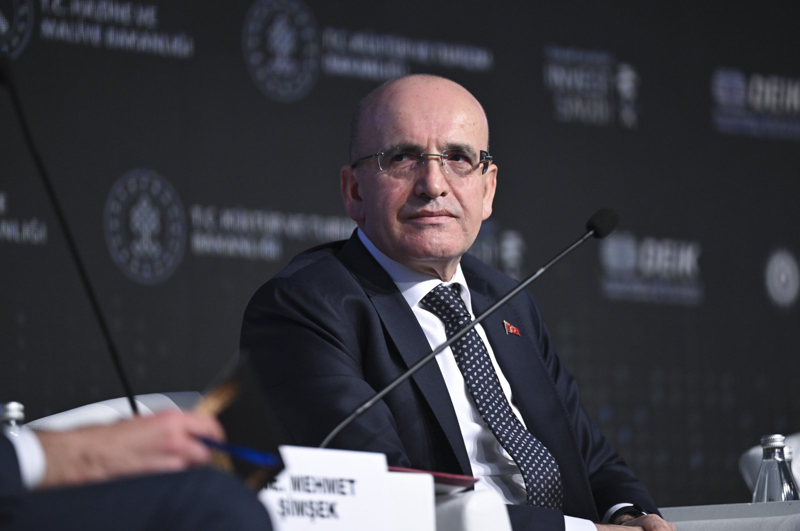 Treasury and Finance Minister Mehmet Şimşek attends a panel as part of the Türkiye-Saudi Arabia Investment and Business Forum, Istanbul, Türkiye, Feb. 16, 2024. (AA Photo)