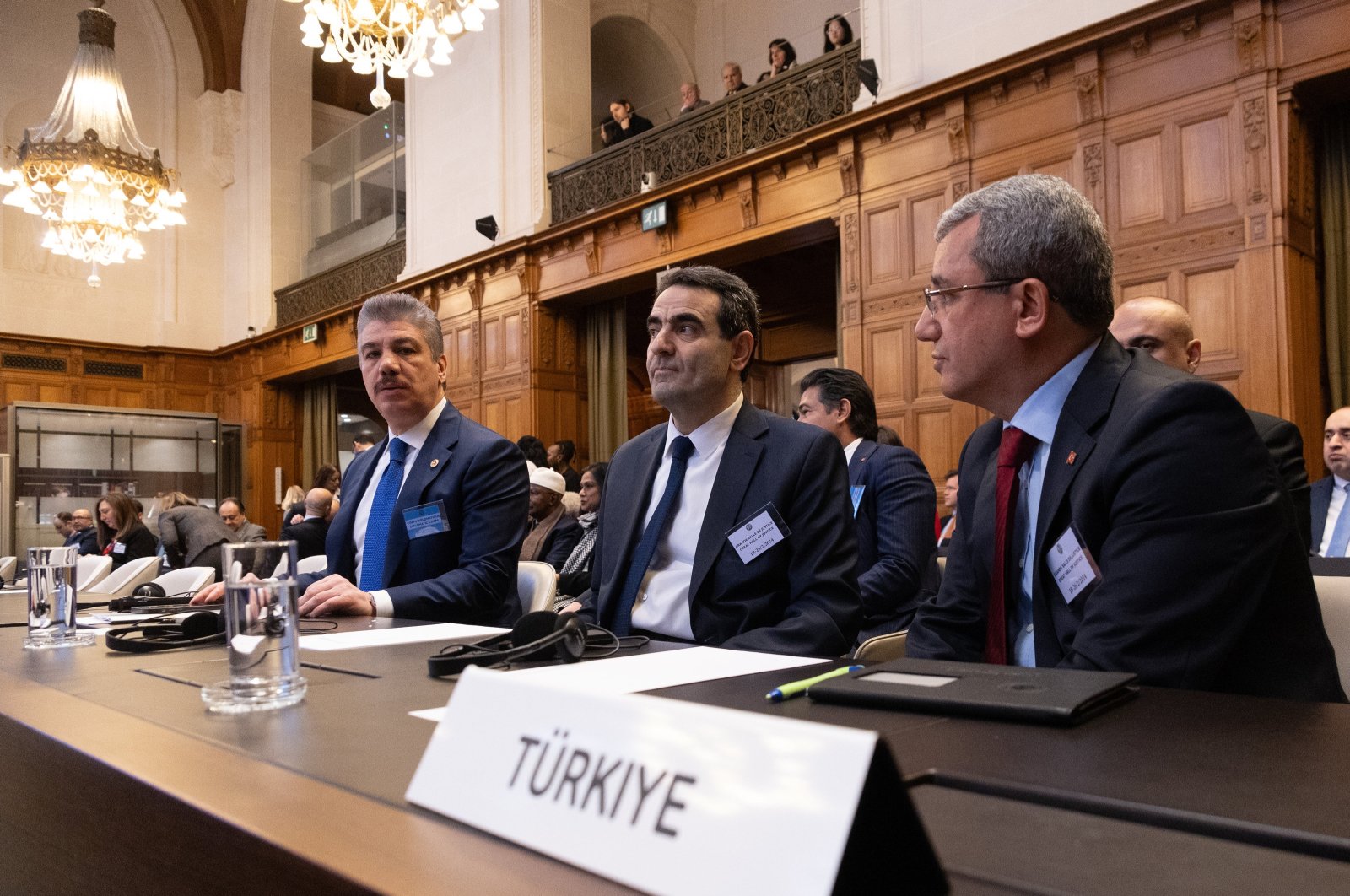 Deputy Foreign Minister Ahmet Yıldız (R), Turkish Parliamentary Justice Commission Chair Cüneyt Yüksel (L) and Turkish Ambassador to The Hague Selçuk Ünal (C) attend a hearing at the International Court of Justice (ICJ) on the legal consequences of the Israeli occupation of Palestinian territories, The Hague, the Netherlands, Feb. 26, 2024. (AA Photo)