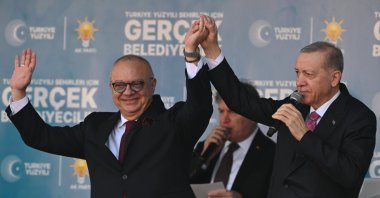 President Recep Tayyip Erdoğan greets the public with mayoral candidate Cengiz Ergün (L), Manisa, western Türkiye, Feb. 27, 2024. (AA Photo)