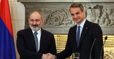 Greek Prime Minister Kyriakos Mitsotakis (Right) and Prime Minister of Armenia, Nikol Pashinyan (Left), shake hands as they give statements after their meeting in Athens, Greece, Feb. 27, 2024. (EPA Photo)