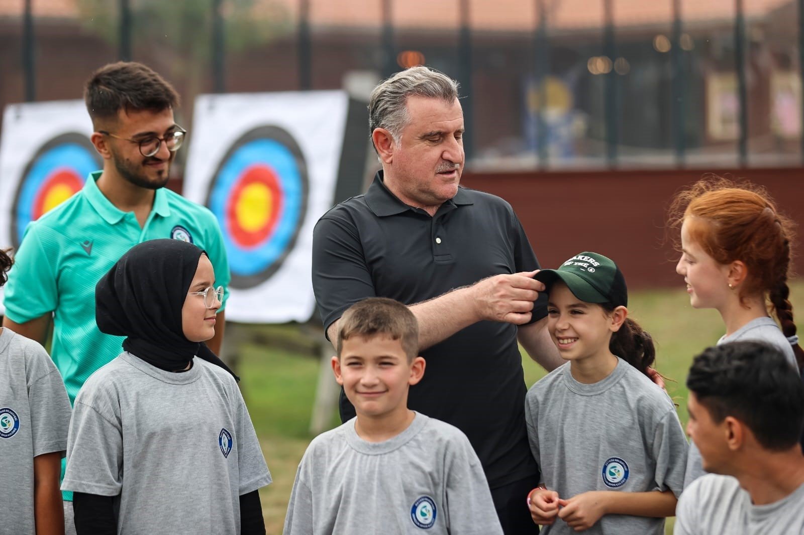 Youth and Sports Minister Osman Aşkın Bak (C) with children at the &quot;First Step into Sport&quot; project, Ankara, Türkiye, Feb. 28, 2024. (IHA Photo)
