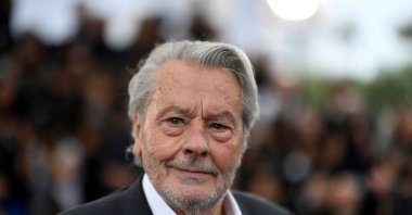French actor Alain Delon poses during a photocall before being awarded with an Honorary Palme d'Or at the 72nd edition of the Cannes Film Festival, Cannes, France, May 19, 2019. (AFP Photo)