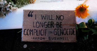 Demonstrators leave notes and flowers during a protest for Palestinians killed by Israel and a U.S. Air Force service member, Aaron Bushnell, who died after setting himself on fire outside the Israeli Embassy in Washington in protest against Israel&#039;s onslaught in the Gaza Strip, New York, U.S., Feb. 27, 2024. (Reuters Photo)