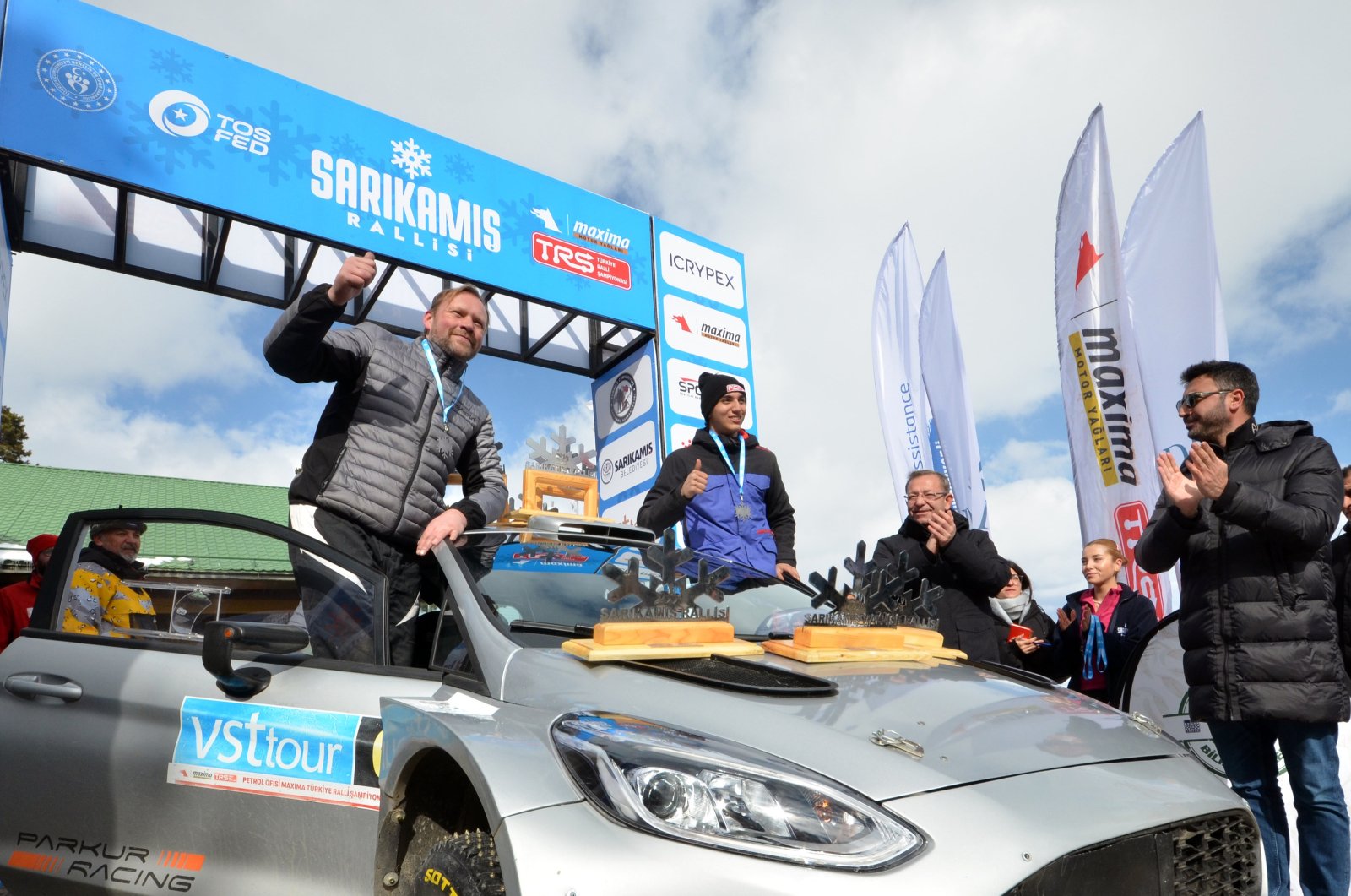 Turkish driver Kerem Kazaz (2nd L) celebrates after winning the Sarıkamış Rally, the opening race of the Turkish Rally Championship, Kars, Türkiye, Feb. 25, 2024. (AA Photo)